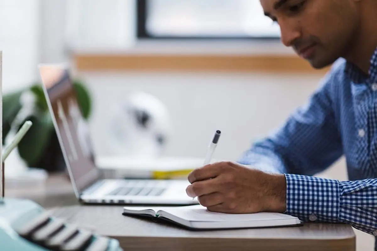 person-researching-a-topic-on-a-laptop