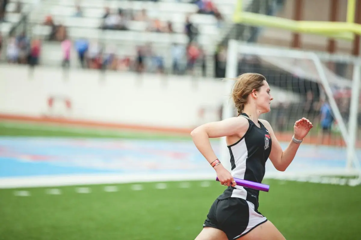 A runner with a baton