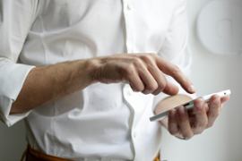 Helpline a person on a smartphone