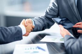 businessmen-shake-hands-deal-partnership