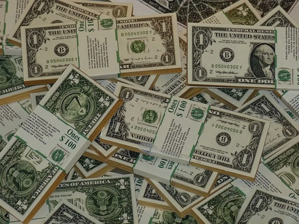 money-one-dollar-bills-in-stacks
