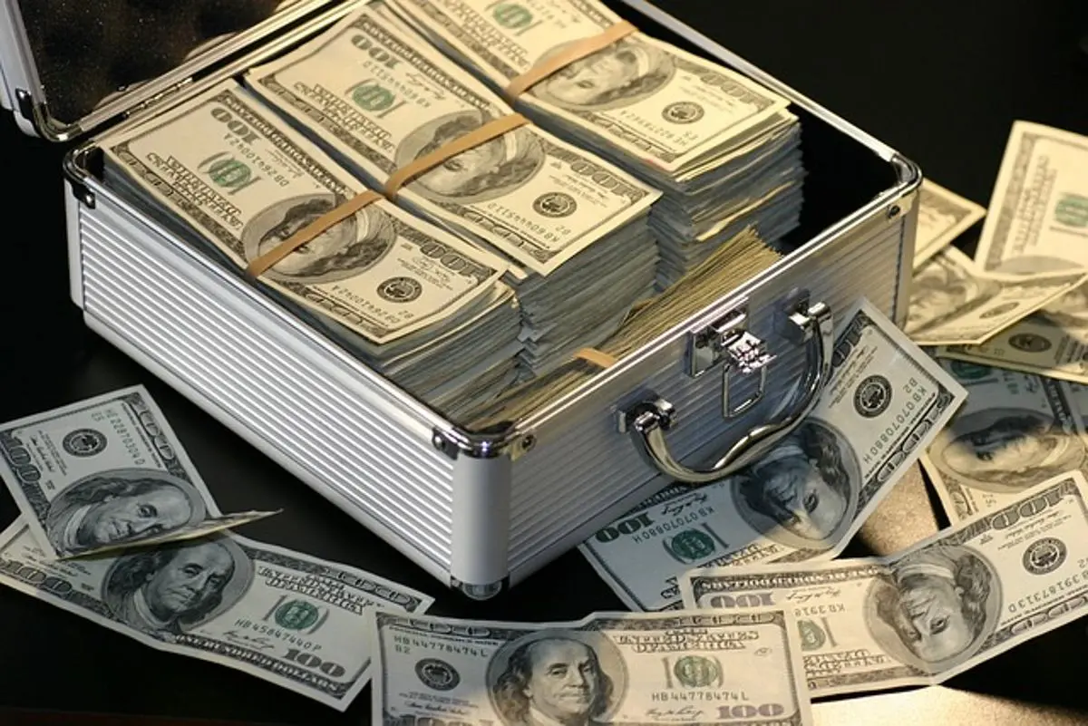 us-dollars-in-a-suitcase