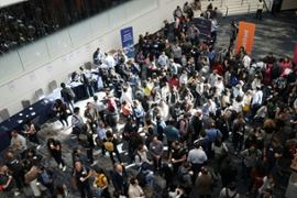 Bunch of people gatheirng for a business event 