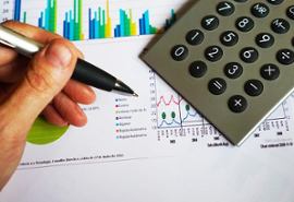 calculator-pen-and-a-financial-report