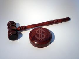 hammer-and-dish-with-dollar-sign-symbolizing-fine-penalty
