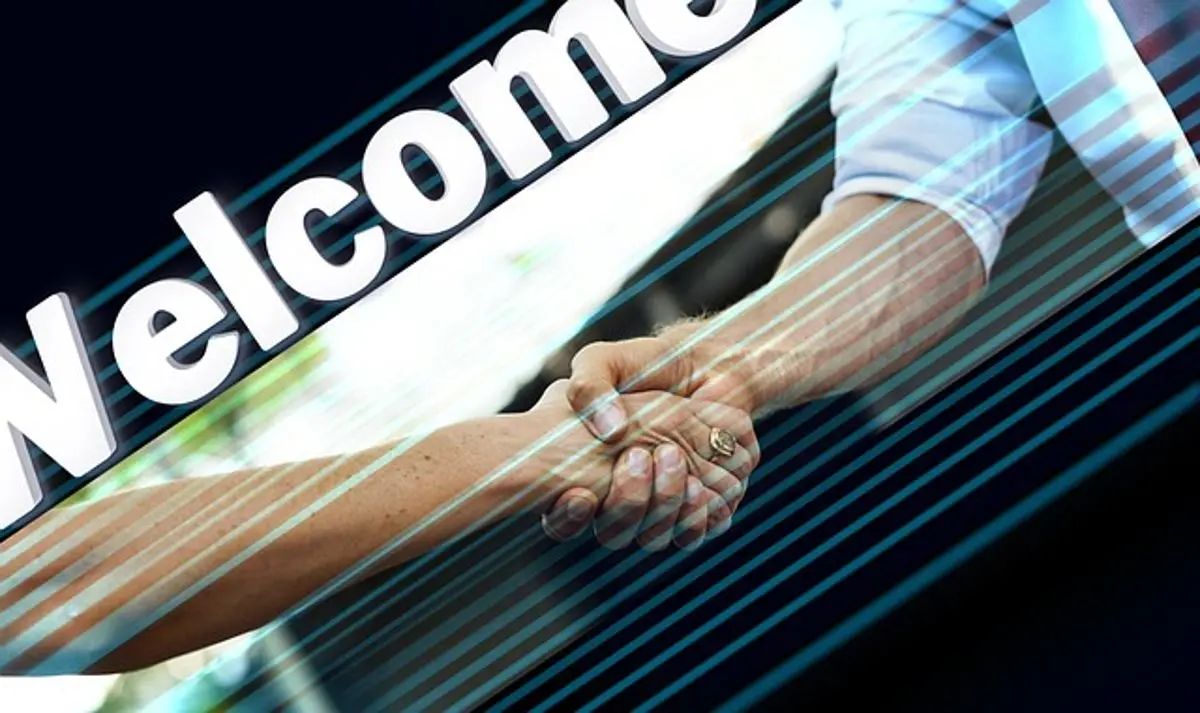 businessman-and-woman-shake-hands
