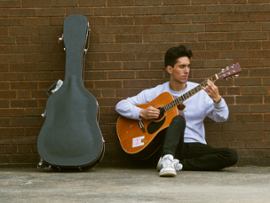 person playing guitar