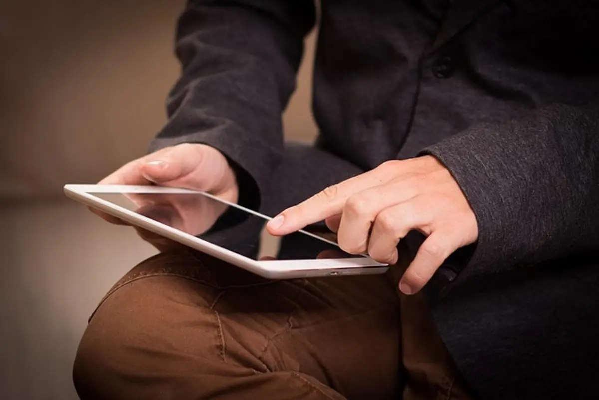person-holding-a-tablet
