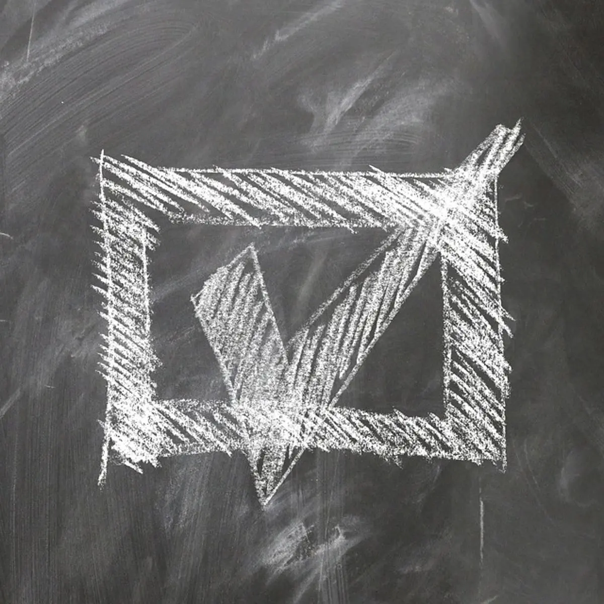 checkmark-written-on-black-board