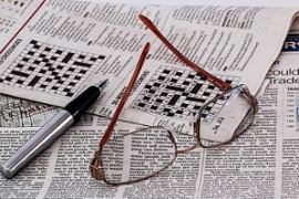 newspaper-glasses-and-crossword-puzzle