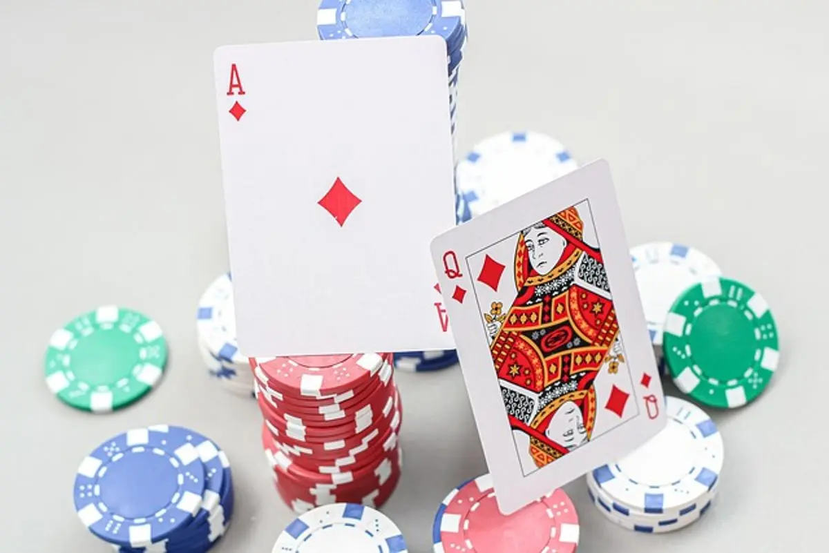 blackjack-cards-ace-and-queen-along-with-casino-chips