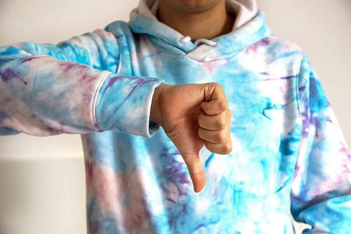 thumb-down-gesture-person