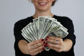 woman-holding-money