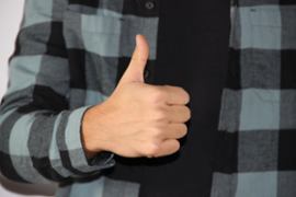 person-holding-thumb-up-gesture