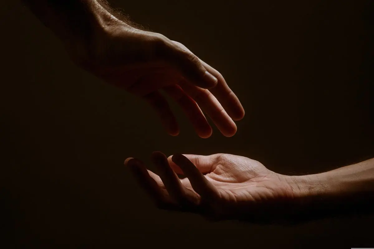 hands-reaching-each-other