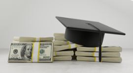 college-hat-and-stacks-of-cash