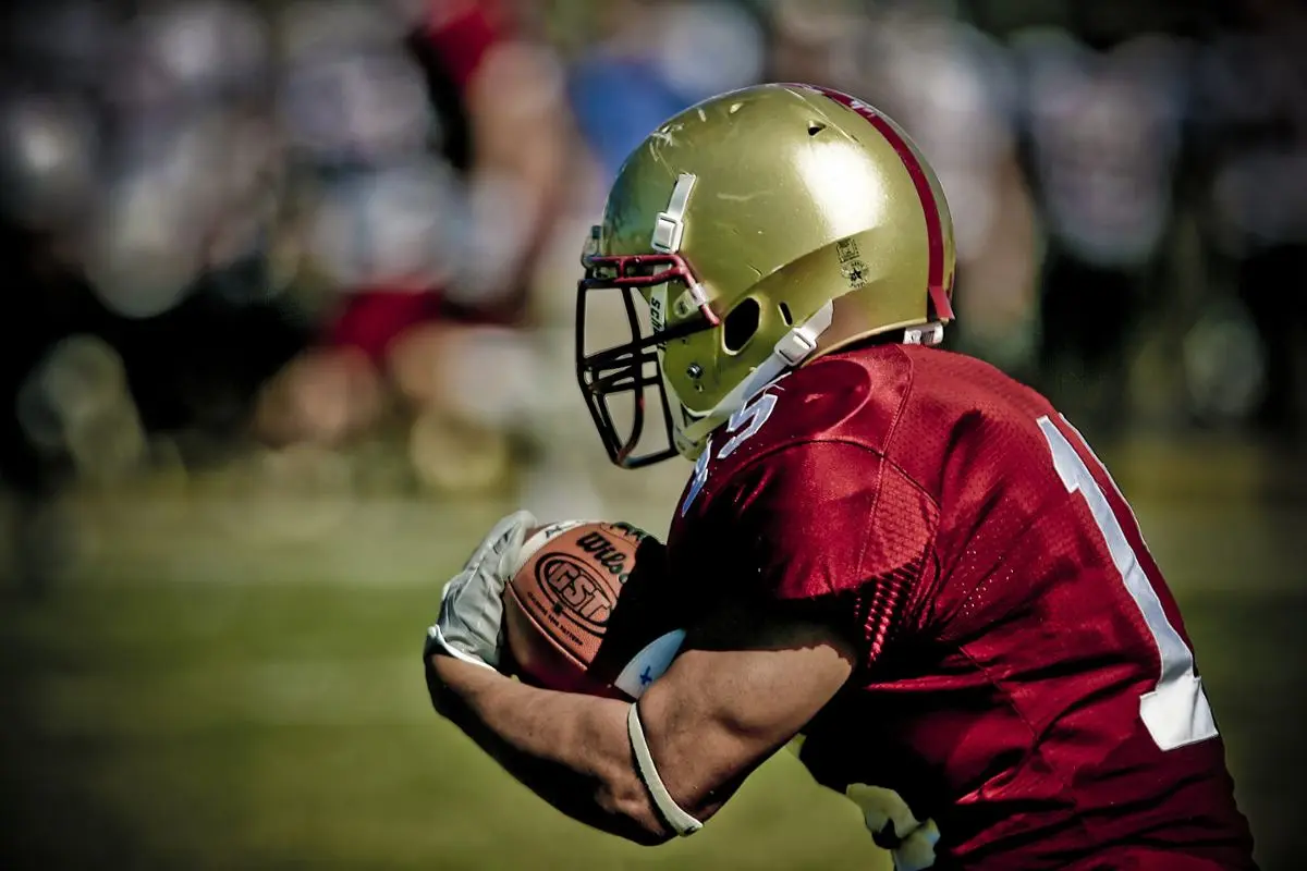 football-player-holding-a-ball