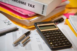income-tax-book-and-calculator