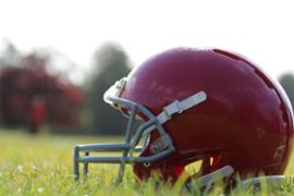 american-football-helmet-on-grass
