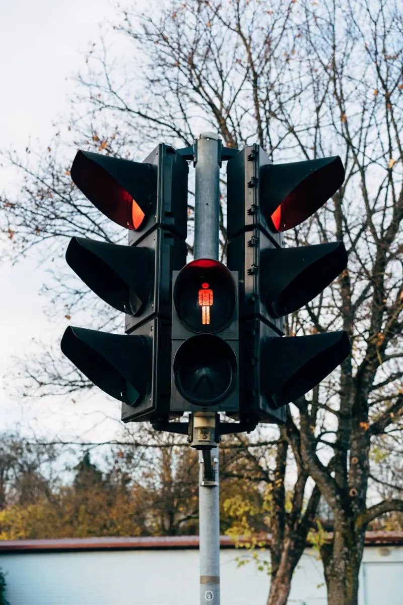 A traffic light barring pedestrians from crossing.