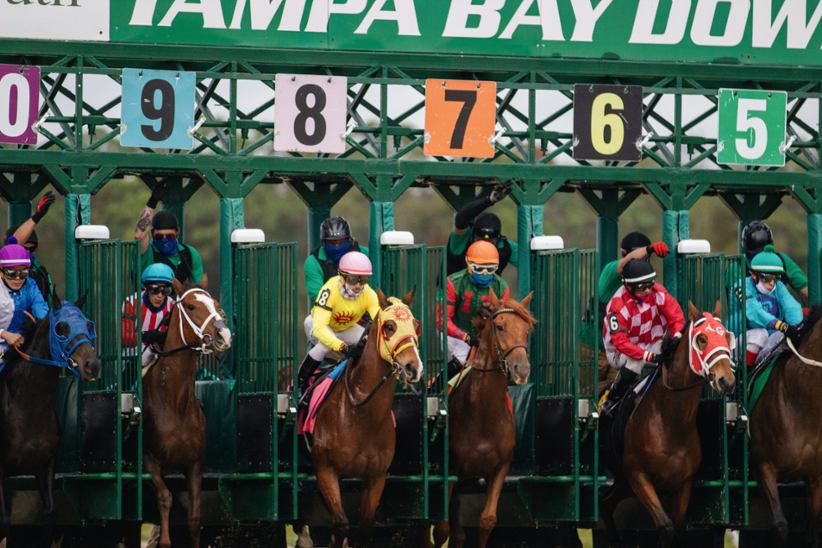 Jockeys preparing for a race.