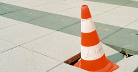 A warning prop that indicates a broken area of pavement.