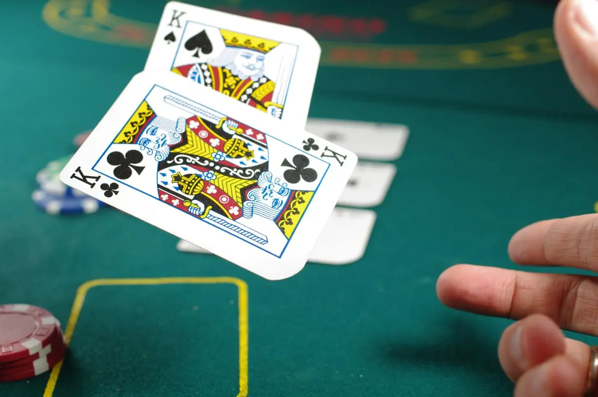 A poker card being flicked.