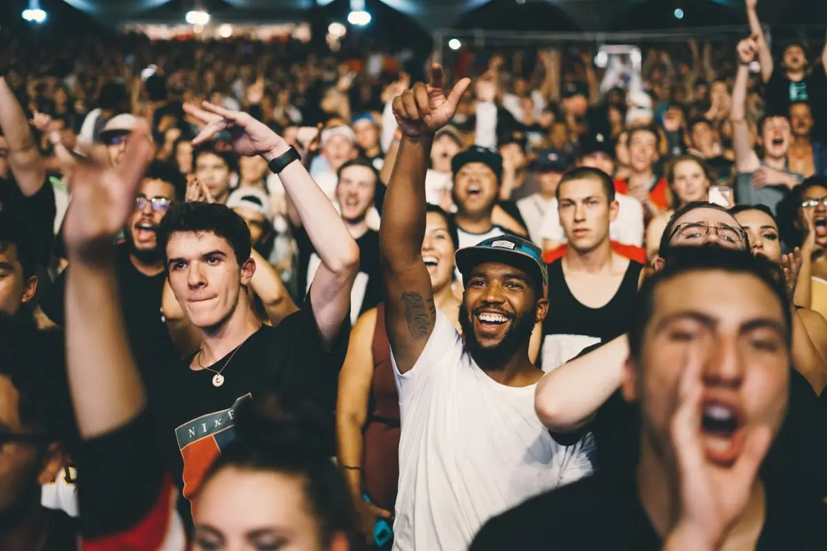 Football fans cheering.