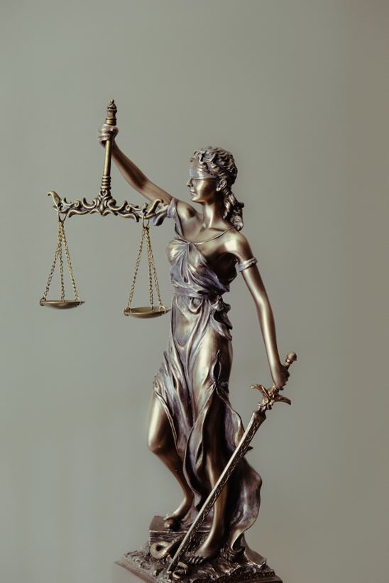 A court of law and Lady Justice statuette.