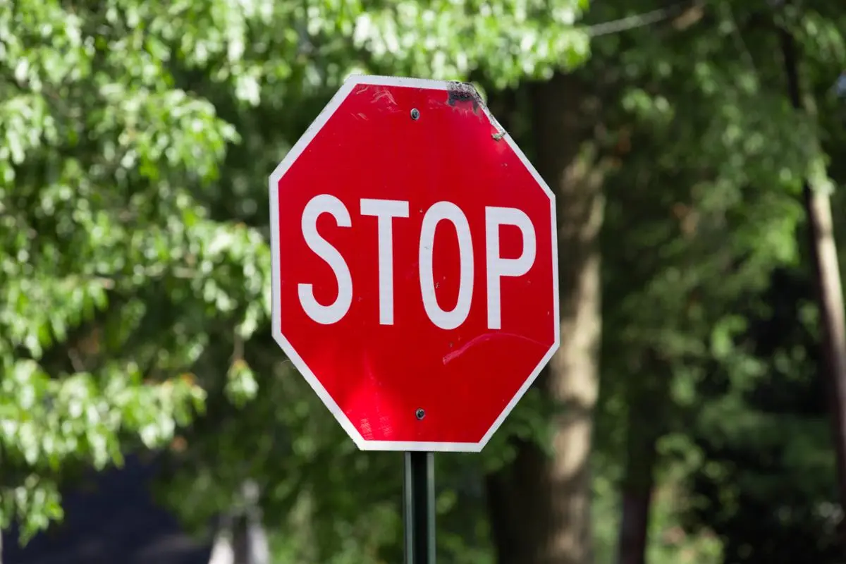 A sign that says Stop.