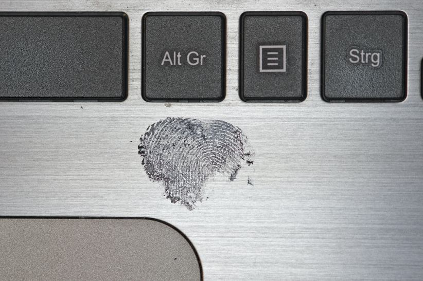 A fingerprint on a keyboard.