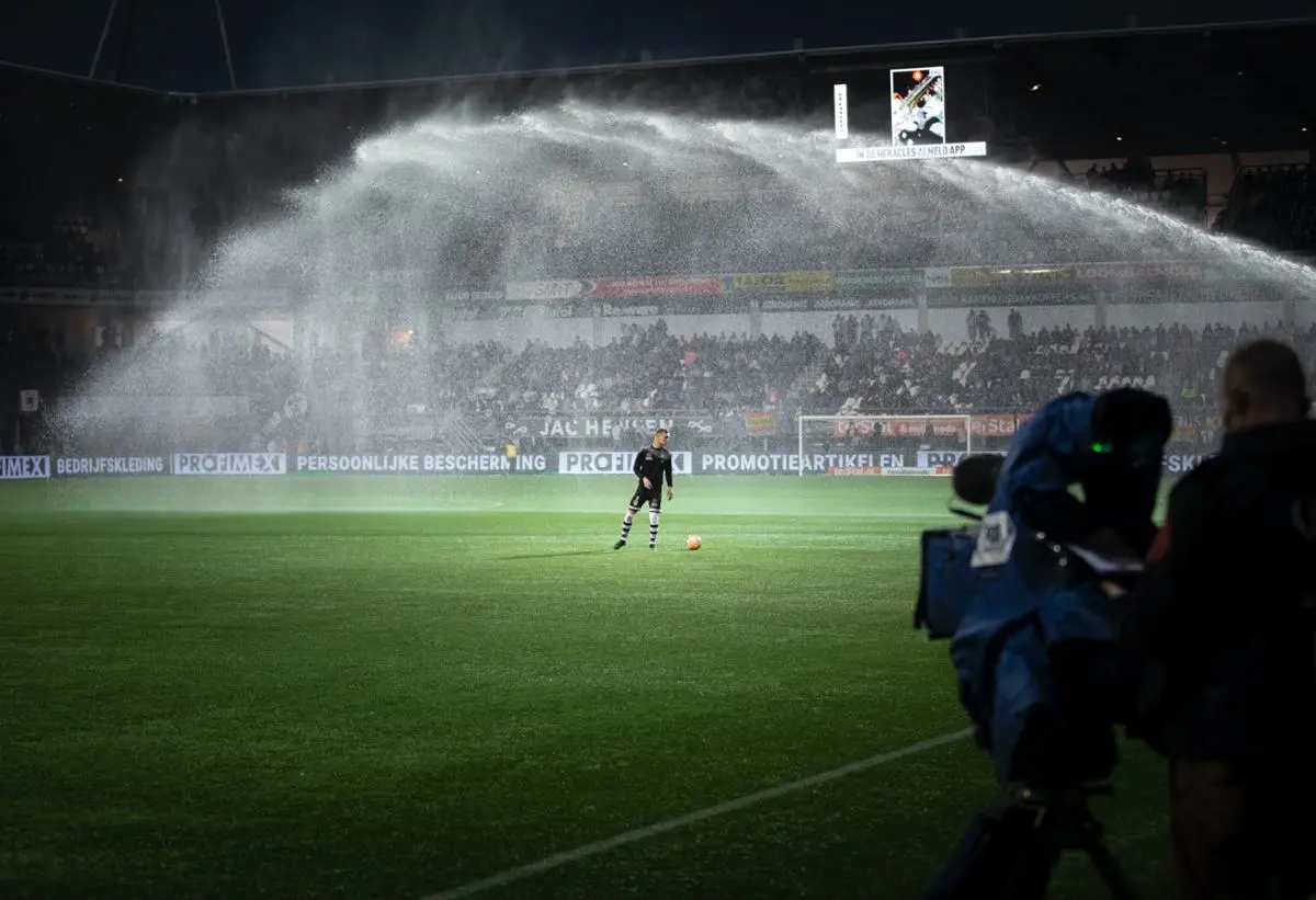 A football field with a player on it.