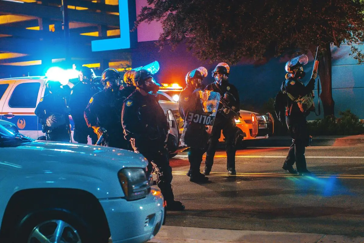 Police officers preparing for a raid.