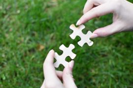 Partnership two pieces fitting together.