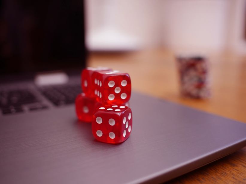 dice-on-top-of-laptop