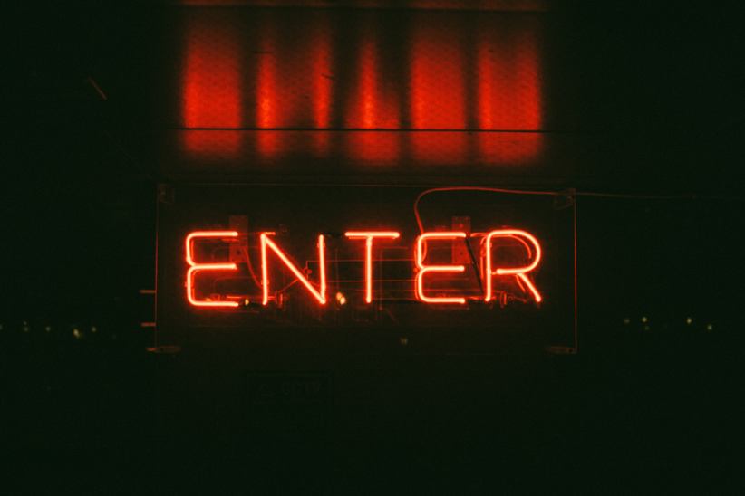 A sign that says enter