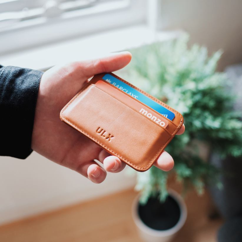 A wallet with bank cards in it.