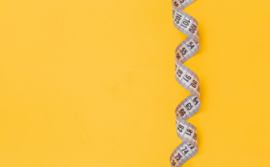 A tape measure dropping from the sky.