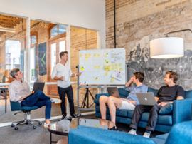 A partnership with a bunch of people discussing strategy.