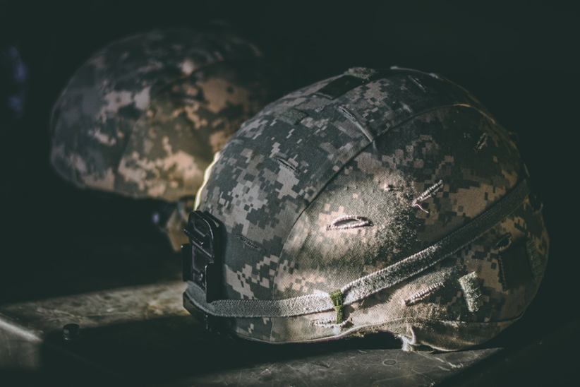 Military veterans' helmets.