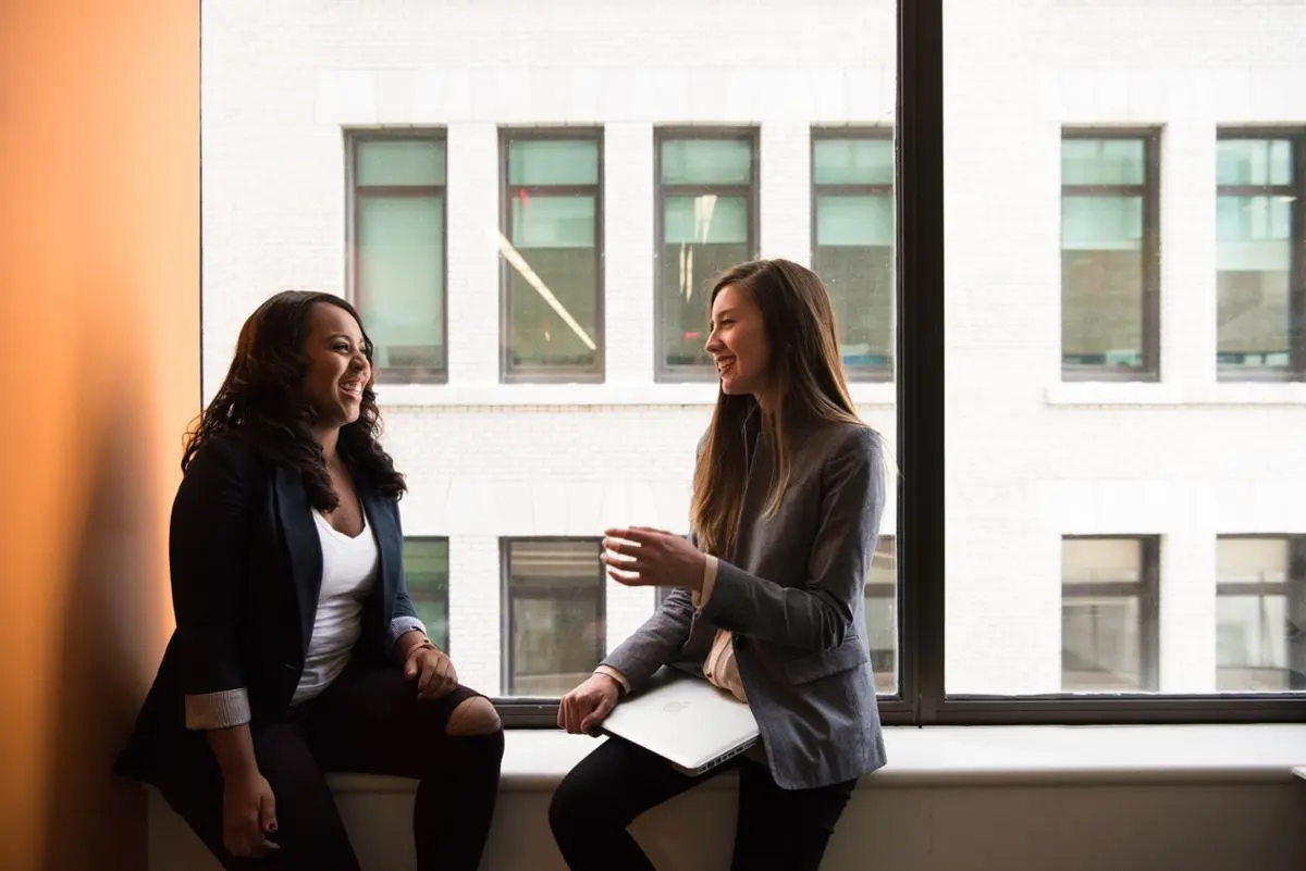 Two colleagues discussing some business.