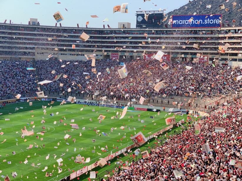 A soccer stadium with fans.