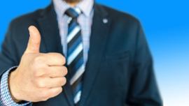 businessman-making-thumb-up-gesture