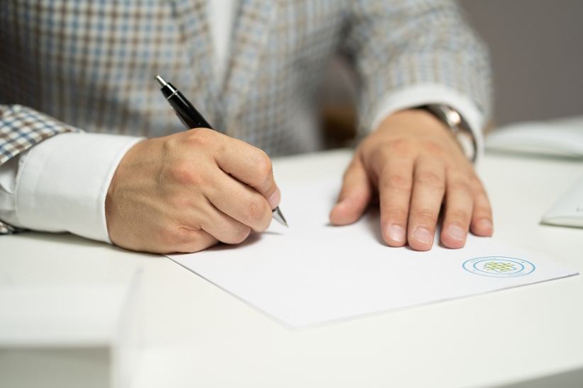 businessman-signing-document