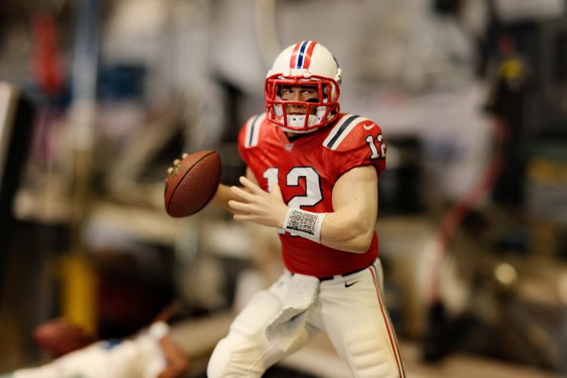 NFL player throwing a ball.