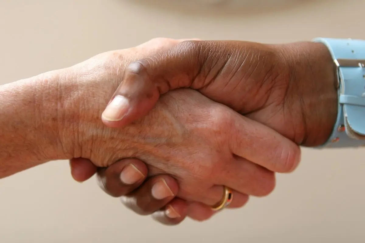 man-and-woman-shake-hands