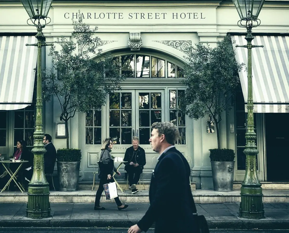 People walking on a British highstreet.