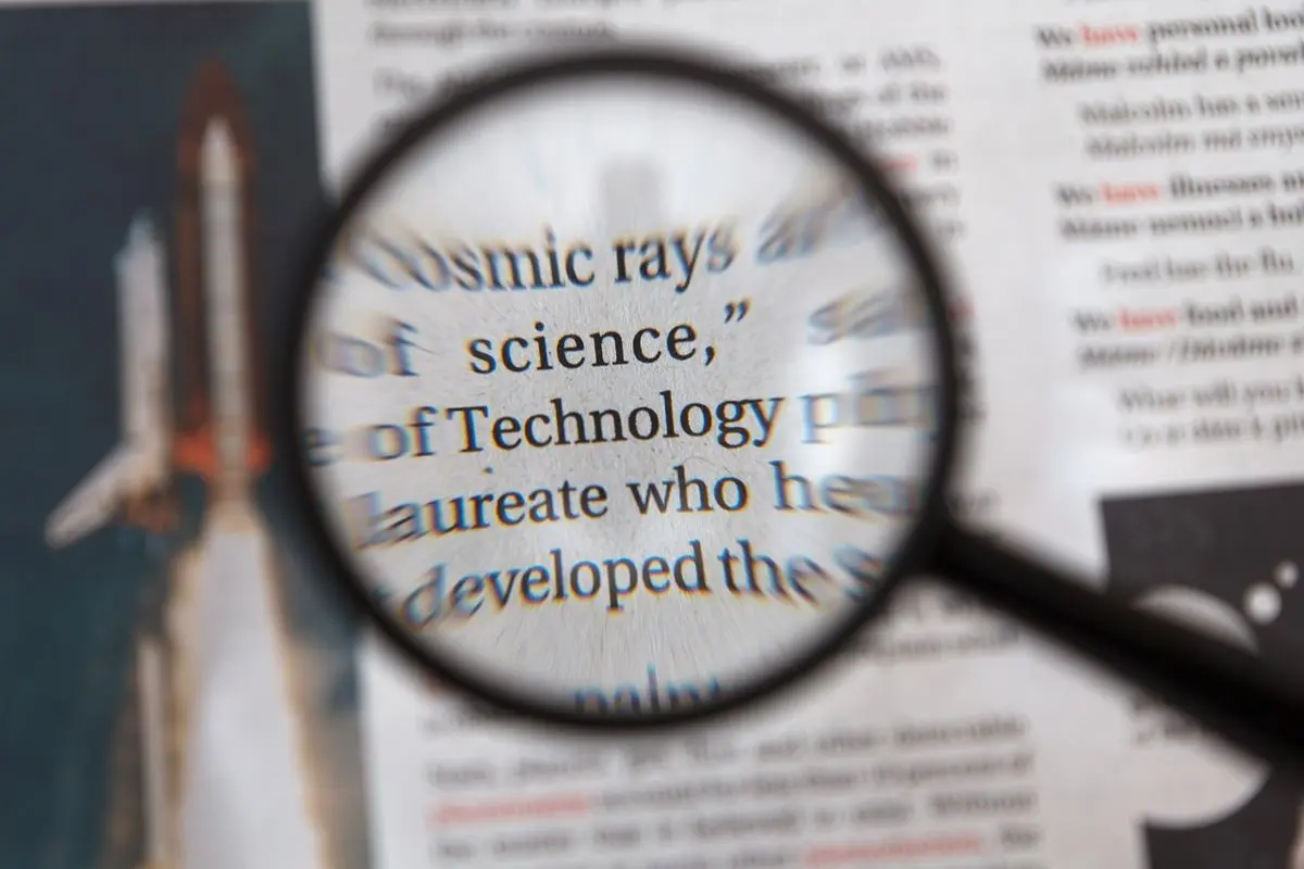 a-magnifying-glass-focused-on-a-book