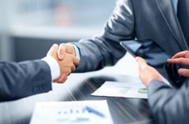 businessmen-shake-hands-finance