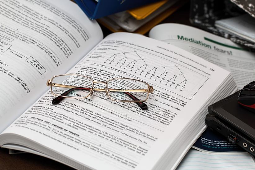 accounting-book-and-glasses